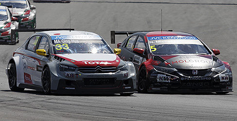 Qing Hua Ma y Norbert Michelisz